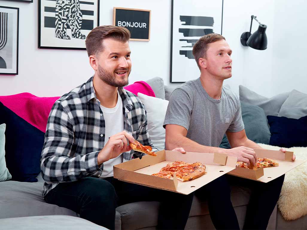 Students eating pizza delivery